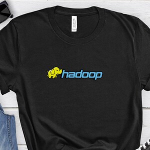 May include: A black t-shirt with a yellow elephant logo and the text "hadoop" in blue.