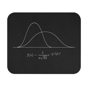 May include: Black mousepad featuring a white line graph of two bell curves. Below the graph is a mathematical formula. The mousepad has rounded corners.