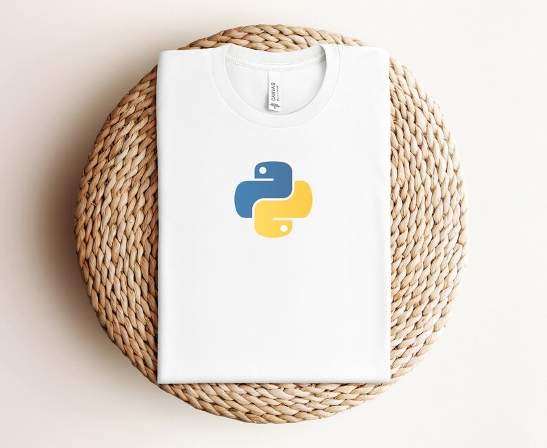 May include: White t-shirt with a blue and yellow Python logo.