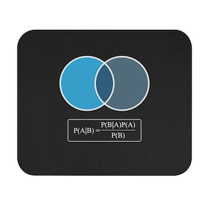 May include: Black rectangular mousepad featuring a Venn diagram with two overlapping circles in shades of blue. Below the diagram is a mathematical formula: P(A|B) = P(B|A)P(A) / P(B).