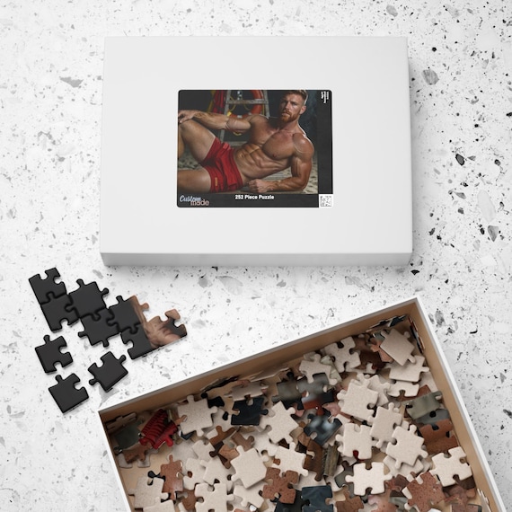 Puzzle de plage « Maître-nageur roux et musclé » — 8