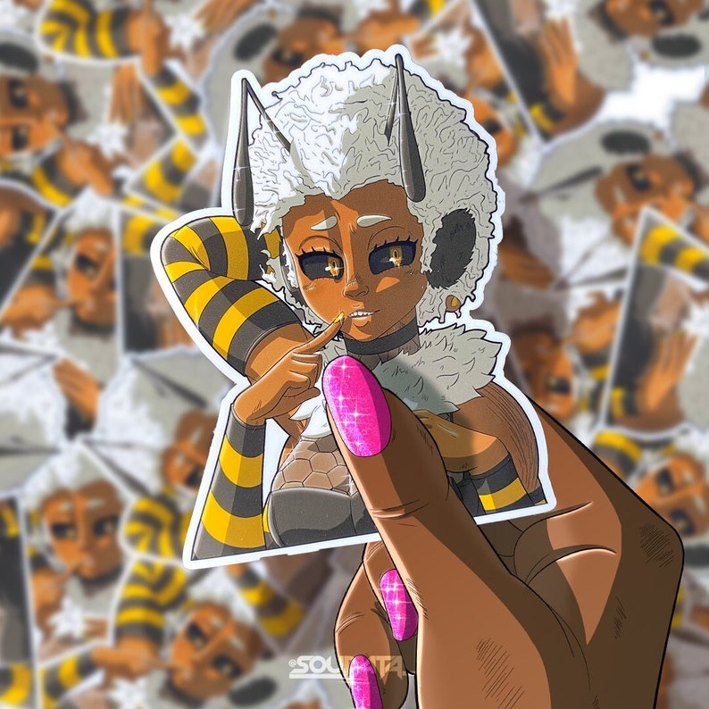 May include: A sticker featuring a cartoon bee with black and yellow stripes, white hair, and a pink nail. The bee is wearing a black and gold outfit and has a mischievous expression.