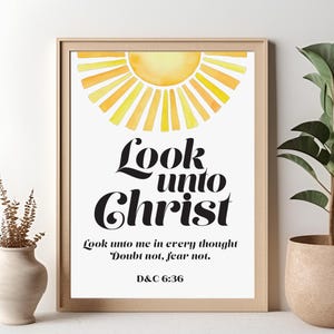 May include: A watercolor print with a yellow sun and the text "Look unto Christ" in black. The text below reads "Look unto me in every thought Doubt not, fear not. D&C 6:36".