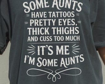 Funny Aunt T-Shirt: Tattoos, Pretty Eyes, Thick Thighs - Ethically Sourced Cotton