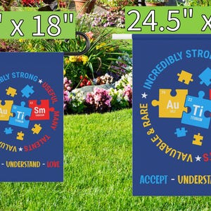 May include: Two garden flags with a blue background and a circle of puzzle pieces with the words "Incredibly Strong, Valuable & Rare, Useful Many Talents, Accept - Understand - Love" around the circle. The smaller flag is 12 inches by 18 inches and the larger flag is 24.5 inches by 32 inches.