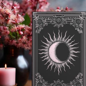 Let your thoughts drift into the mystical with this Gothic Sun & Moon Eclipse Journal. The ornate vintage border and celestial centerpiece make it the perfect notebook for witches, poets, and dark academia lovers alike.