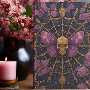 Hardcover journal featuring an ornate gothic design of a golden skull with purple butterfly wings at the center of a golden spiderweb. Surrounded by rich purple flowers, butterflies, and intricate details, all set against a dark, swirling background.