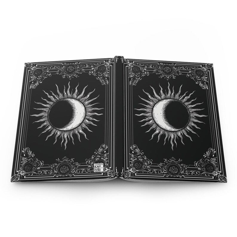 Let your thoughts drift into the mystical with this Gothic Sun & Moon Eclipse Journal. The ornate vintage border and celestial centerpiece make it the perfect notebook for witches, poets, and dark academia lovers alike.