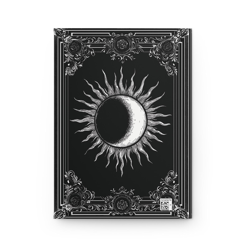 Let your thoughts drift into the mystical with this Gothic Sun & Moon Eclipse Journal. The ornate vintage border and celestial centerpiece make it the perfect notebook for witches, poets, and dark academia lovers alike.