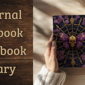 Hardcover journal featuring an ornate gothic design of a golden skull with purple butterfly wings at the center of a golden spiderweb. Surrounded by rich purple flowers, butterflies, and intricate details, all set against a dark, swirling background.