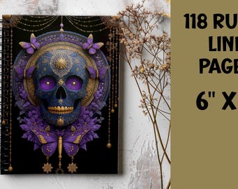 May include: Spiral-bound notebook with a detailed skull design. The skull is blue with purple eyes and gold accents, surrounded by purple butterflies and floral elements. The notebook has 118 ruled line pages and measures 6" x 8".
