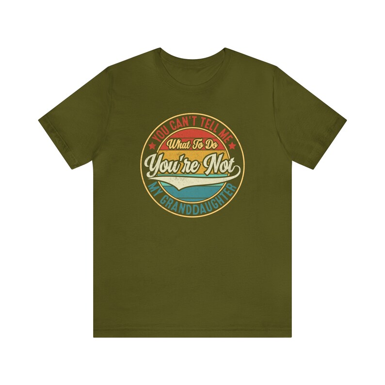 May include: Olive green t-shirt with a vintage-style circular graphic that says "You Can't Tell Me What To Do You're Not My Granddaughter".