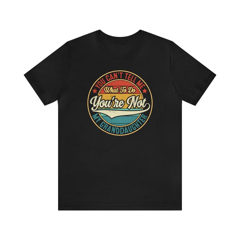 May include: Black t-shirt with a vintage-style graphic that says "You can't tell me what to do. You're not my granddaughter."