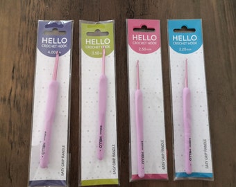 May include: Four pink crochet hooks with easy grip handles. The hooks are labeled with the size in millimeters: 4.00 mm, 3.50 mm, 2.50 mm, and 2.20 mm.