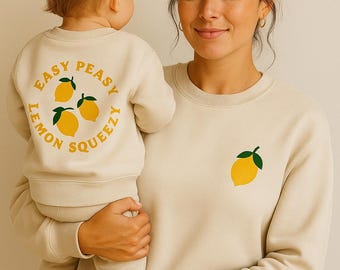 Felpe abbinate »Easy Peasy Lemon Squeezy« in cotone biologico | Stampa con slogan sul retro, stampa sul petto | Oversize | Regalo sostenibile