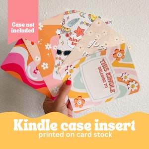 May include: Set of six colorful and patterned printable inserts for a Kindle case. The inserts feature various designs, including swirls, flowers, and text that says "This Kindle belongs to".