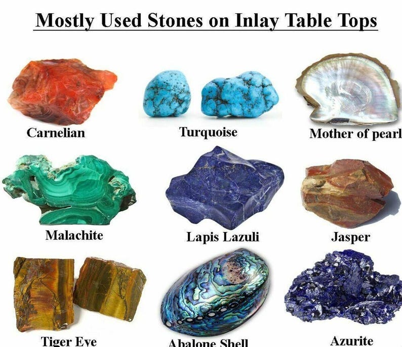 May include: A collection of nine different stones used for inlay table tops. The stones are: carnelian, turquoise, mother of pearl, malachite, lapis lazuli, jasper, tiger eye, abalone shell, and azurite.