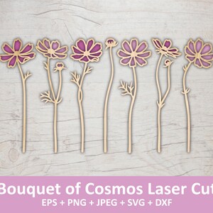Puede incluir: Flores de cosmos de madera cortadas con láser, con pétalos morados y tallos de madera natural. La imagen muestra siete flores individuales en varias etapas de floración. El texto en la parte inferior dice "Bouquet of Cosmos Laser Cut".