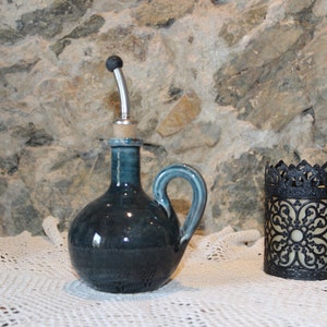 Handcrafted ceramic oil or vinegar bottle