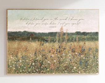 Könnte beinhalten: Ein Aquarellgemälde eines Wildblumenfeldes mit einem Zitat aus Jeremia 1,5: "Ehe ich dich im Mutterleib formte, kannte ich dich, ehe du aus dem Leib gingst, habe ich dich geheiligt."