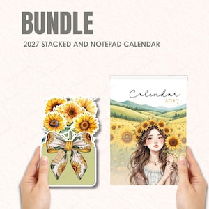 May include: A bundle of 2027 stacked and notepad calendars. One calendar features a watercolor illustration of sunflowers in a vase with a bow. The other calendar has a girl with a sunflower crown in a field.