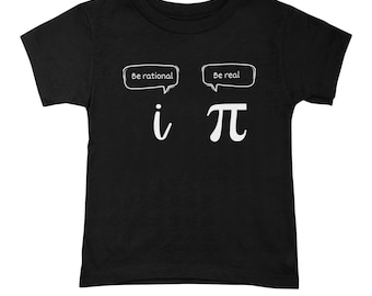 May include: Black short-sleeved t-shirt with white text and graphics. The text says "Be rational" and "Be real" in speech bubbles above the letters "i" and "π".