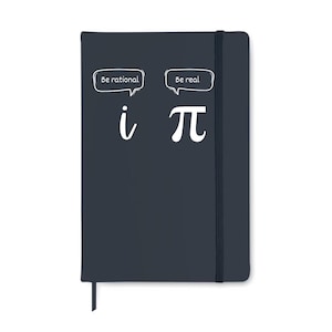 May include: A dark blue notebook featuring the phrases "Be rational" and "Be real" with the symbols "i" and "π". The notebook has a black elastic band and a ribbon bookmark. The text is in white, with the symbols in a handwritten style.