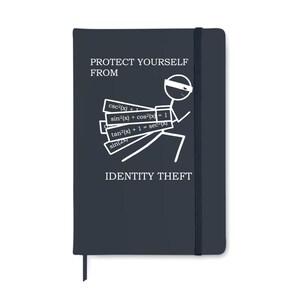 May include: A navy blue notebook with the text "PROTECT YOURSELF FROM IDENTITY THEFT". The notebook features a stick figure wearing a mask, carrying mathematical formulas. It has a black elastic band and a ribbon bookmark.