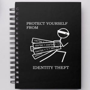 May include: Black spiral-bound notebook with the text "PROTECT YOURSELF FROM IDENTITY THEFT." A stick figure wearing a mask is running with mathematical equations. The notebook is a humorous take on identity theft.