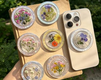 Soporte para teléfono de resina con flores de paniculata secas reales, soporte magnético para teléfono con carcasa holográfica, accesorio floral para Kindle, soporte con forma de nomeolvides para Kindle