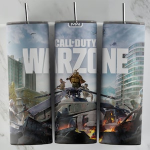 May include: Three 20 oz. stainless steel tumblers with a Call of Duty Warzone design. The tumblers feature a cityscape background with a helicopter and soldiers in the foreground. The text "Call of Duty Warzone" is printed in white on the tumblers.