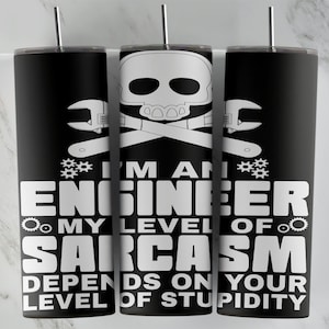 May include: Black stainless steel tumbler with a silver straw. The tumbler features a white graphic of a skull, crossed wrenches, and the text "I'M AN ENGINEER MY LEVEL OF SARCASM DEPENDS ON YOUR LEVEL OF STUPIDITY."