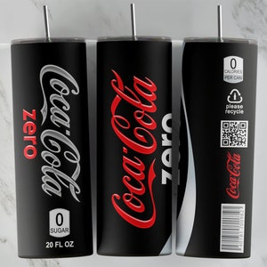 May include: Three black and silver stainless steel tumblers with a Coca-Cola Zero Sugar design. The tumblers are 20 fluid ounces and have a straw.