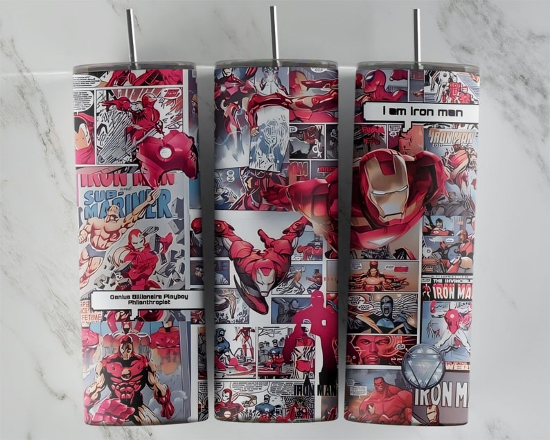 May include: Three stainless steel tumblers with a collage of comic book panels featuring Iron Man. The tumblers have lids and straws. The text on the tumblers reads "I am Iron Man", "Genius Billionaire Playboy Philanthropist", and "Iron Man".