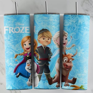 May include: A blue and white tumbler with a Frozen theme. The tumbler features images of Anna, Elsa, Kristoff, Olaf, and Sven. The text "Disney Frozen" is printed on the tumbler.