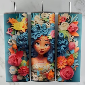 May include: A teal tumbler with a colorful illustration of a woman with blue hair surrounded by flowers and other floral designs. The woman has a pink and white face with brown eyes and a pink mouth.