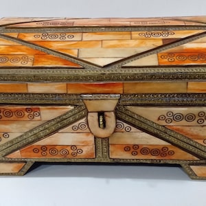 Vintage moroccan box decorated with metal and camel bones