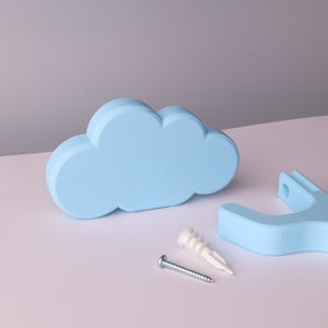 a cloud, wall hook, mounting screw, and drywall anchor