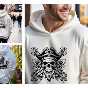 Peut inclure: Sweat-shirt blanc avec deux designs diff&eacute;rents. Un design pr&eacute;sente une illustration en noir et blanc d'un cr&acirc;ne de pirate avec des &eacute;p&eacute;es crois&eacute;es et un chapeau de pirate. L'autre design pr&eacute;sente une illustration en noir et blanc d'un navire &agrave; voile.