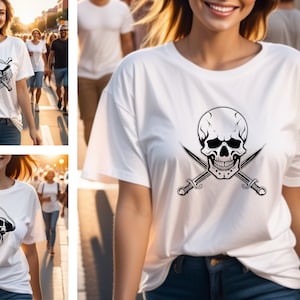 Peut inclure: Deux t-shirts blancs avec un motif de cr&acirc;ne et d'os crois&eacute;s noirs. Un t-shirt pr&eacute;sente un cr&acirc;ne portant un chapeau de pirate, l'autre pr&eacute;sente un cr&acirc;ne avec des &eacute;p&eacute;es crois&eacute;es.