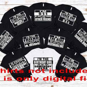 May include: A collection of black t-shirts with white text, each featuring a different humorous phrase. One white t-shirt is also included. Phrases include "I'm the other friend", "I'm the friend", and "I'm the birthday girl".