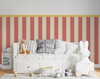 May include: A child's bedroom with a white daybed, pillows, and toys. The wall has a red and cream striped pattern with a yellow scalloped border. A gray pillow reads "Love You to the Moon and Back."
