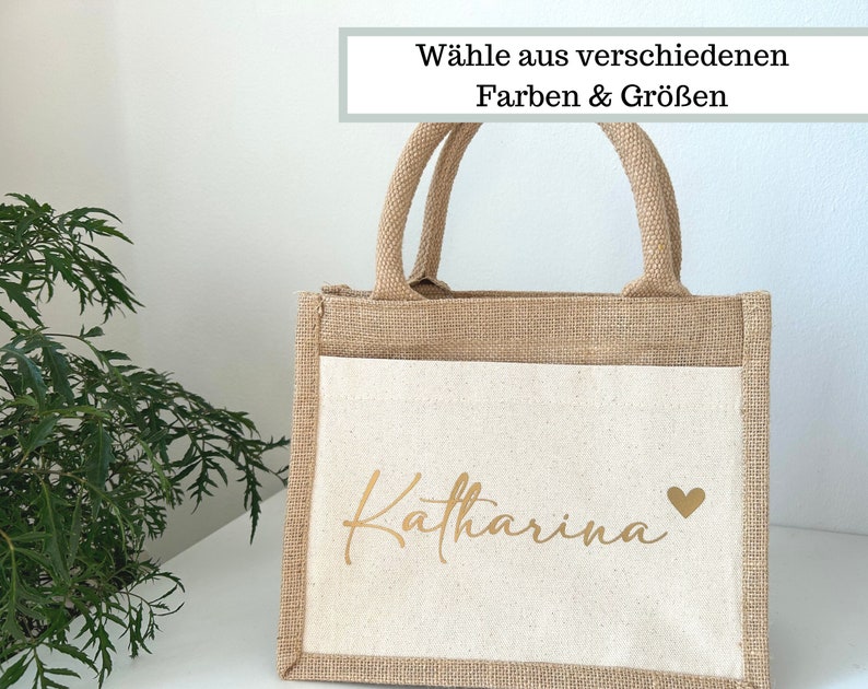 Personalisierte Jutetaschemit Namen und Herz bedruckt. Die Jute Tasche mit Namen ist perfekt als Geschenkfür deine Freundin und ganz personalisiert.