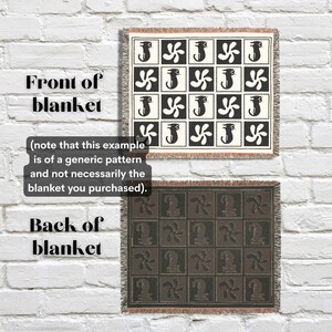 May include: Two woven blankets with a seahorse and propeller pattern. The front blanket is cream and black, and the back blanket is brown and black. The text on the image says "Front of blanket" and "Back of blanket".