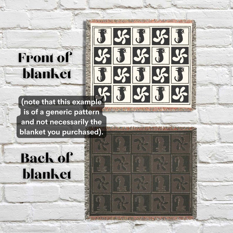 May include: Two woven blankets with a seahorse and propeller pattern. The front blanket is cream and black, and the back blanket is brown and black. The text on the image says "Front of blanket" and "Back of blanket".