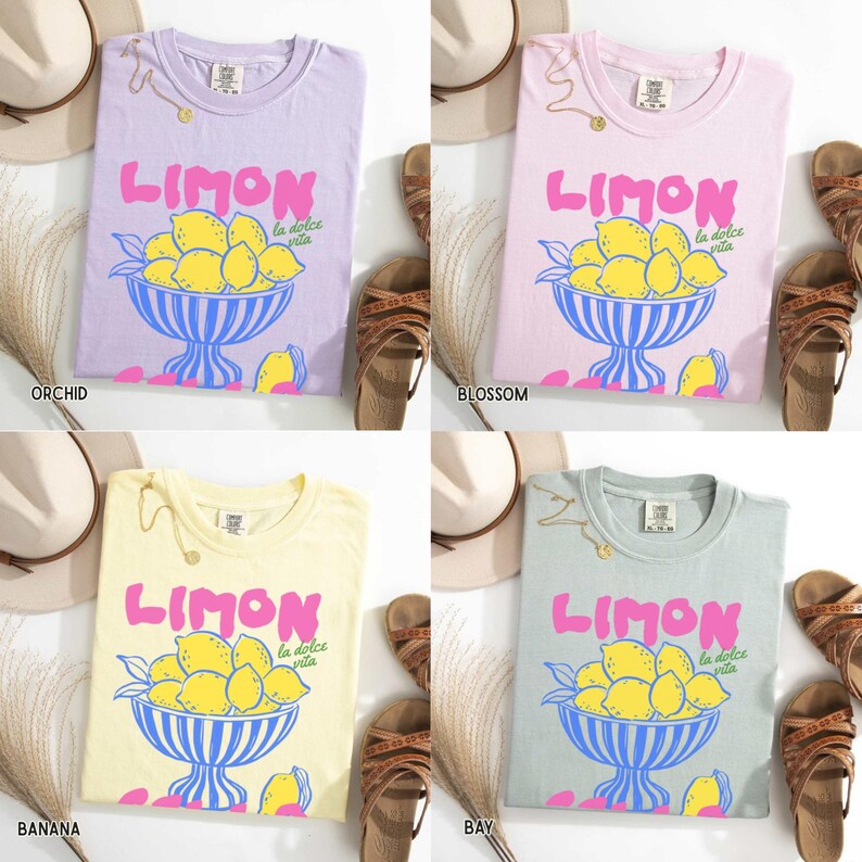 May include: Four t-shirts in different colors: orchid, blossom, banana, and bay. Each shirt features a graphic of lemons in a bowl with the word "LIMON" in pink and the phrase "la dolce vita".