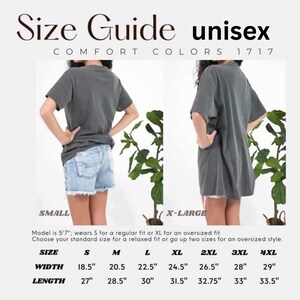 May include: Unisex size chart for a t-shirt with measurements in inches. The chart shows the width and length of the shirt in sizes small, medium, large, extra large, 2XL, 3XL, and 4XL.