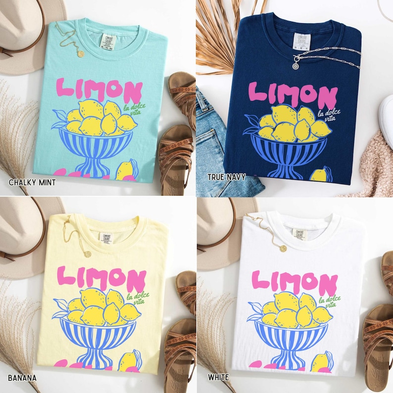 May include: Four t-shirts in different colors: chalky mint, true navy, banana, and white. Each shirt features the word "LIMON" in pink, a bowl of lemons, and the phrase "la dolce vita".