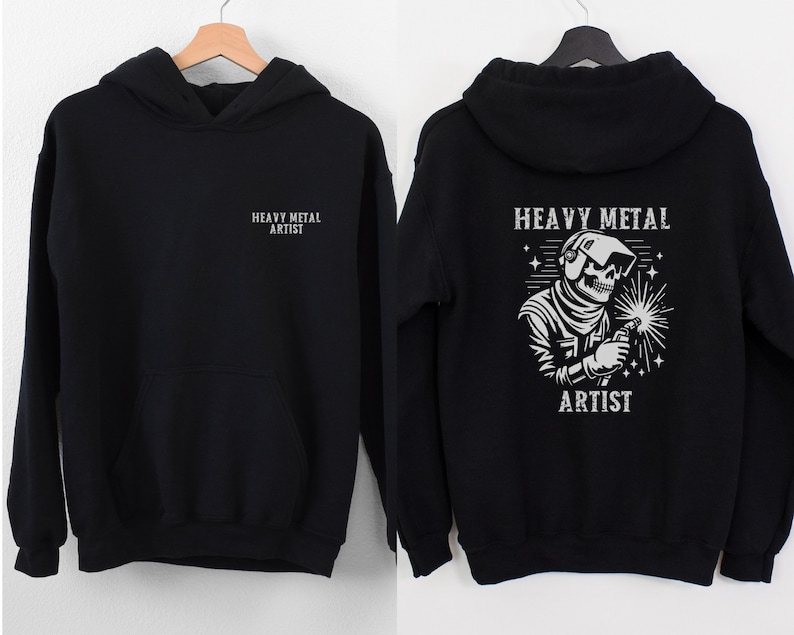 May include: Black hoodie with a white graphic of a skeleton welding with the text "Heavy Metal Artist" on the back and "Heavy Metal Artist" on the front.