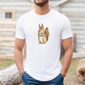 White colored tshirt featuring a fuzzy squirrel drinking a hot coffee.